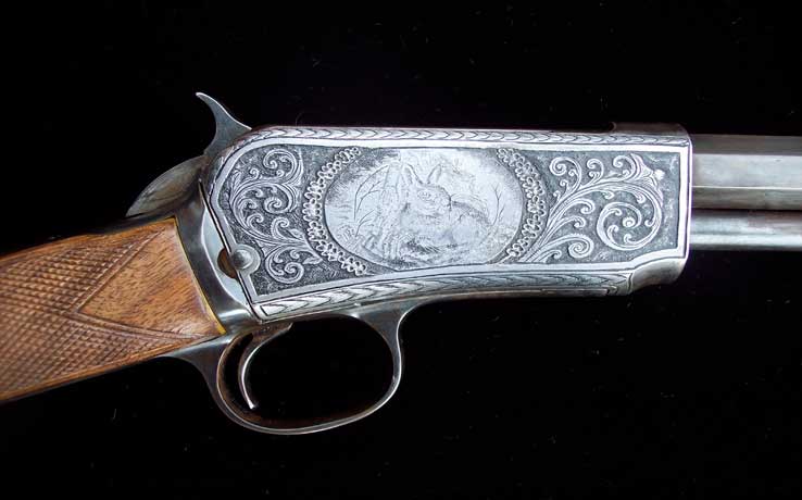 Winchester 22 with engraved rabbit and scrolls