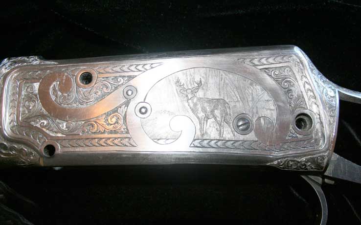Winchester with engraved deer